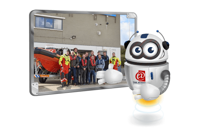 Buddy de mascotte met een foto van de trainees